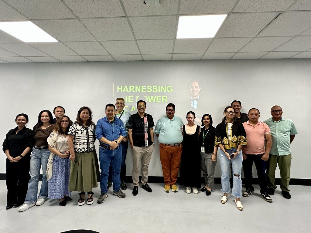 Lapanday AI workshop group photo — the executive and management team with facilitator Jerry Ilao at the Harnessing the Power of AI session, February 2026