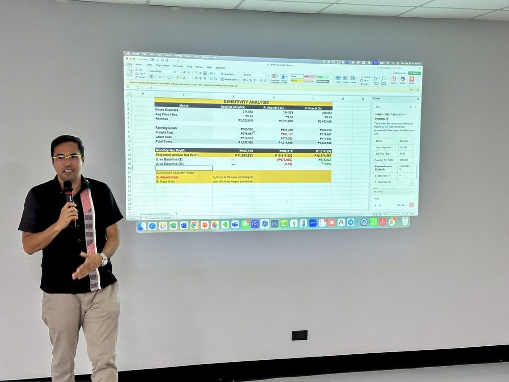Live AI demo at the Lapanday AI workshop — Jerry Ilao showing AI building a sensitivity analysis directly in Excel