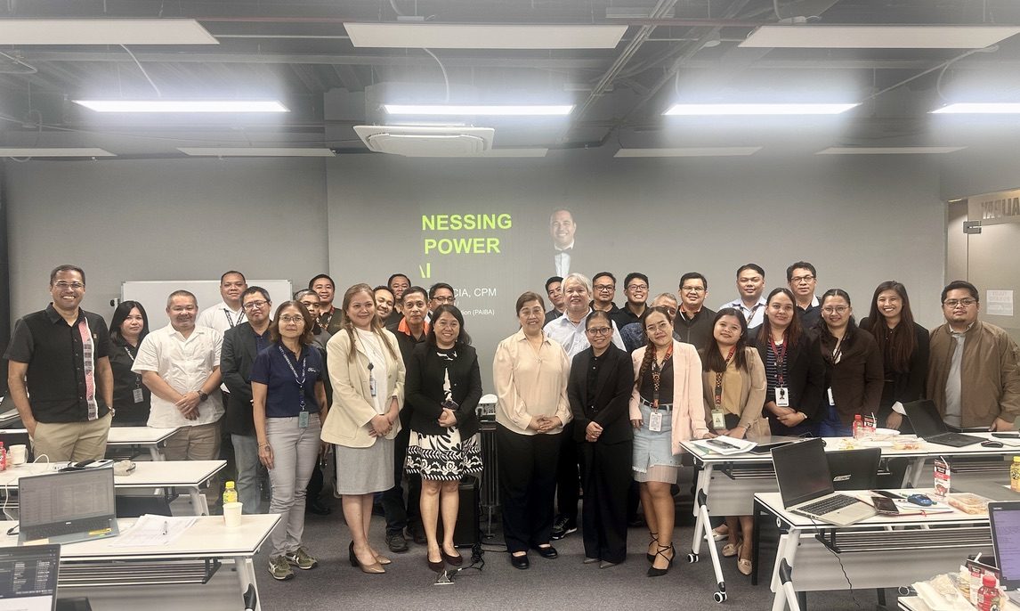 Motor Ace Philippines AI workshop group photo — the executive and management team with facilitator Jerry Ilao at the Harnessing the Power of AI session in Cebu, August 2026