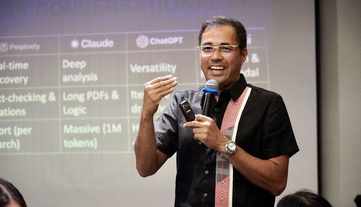 Jerry Ilao teaching AI assistants up close — comparing ChatGPT, Claude, and Perplexity at an AI workshop