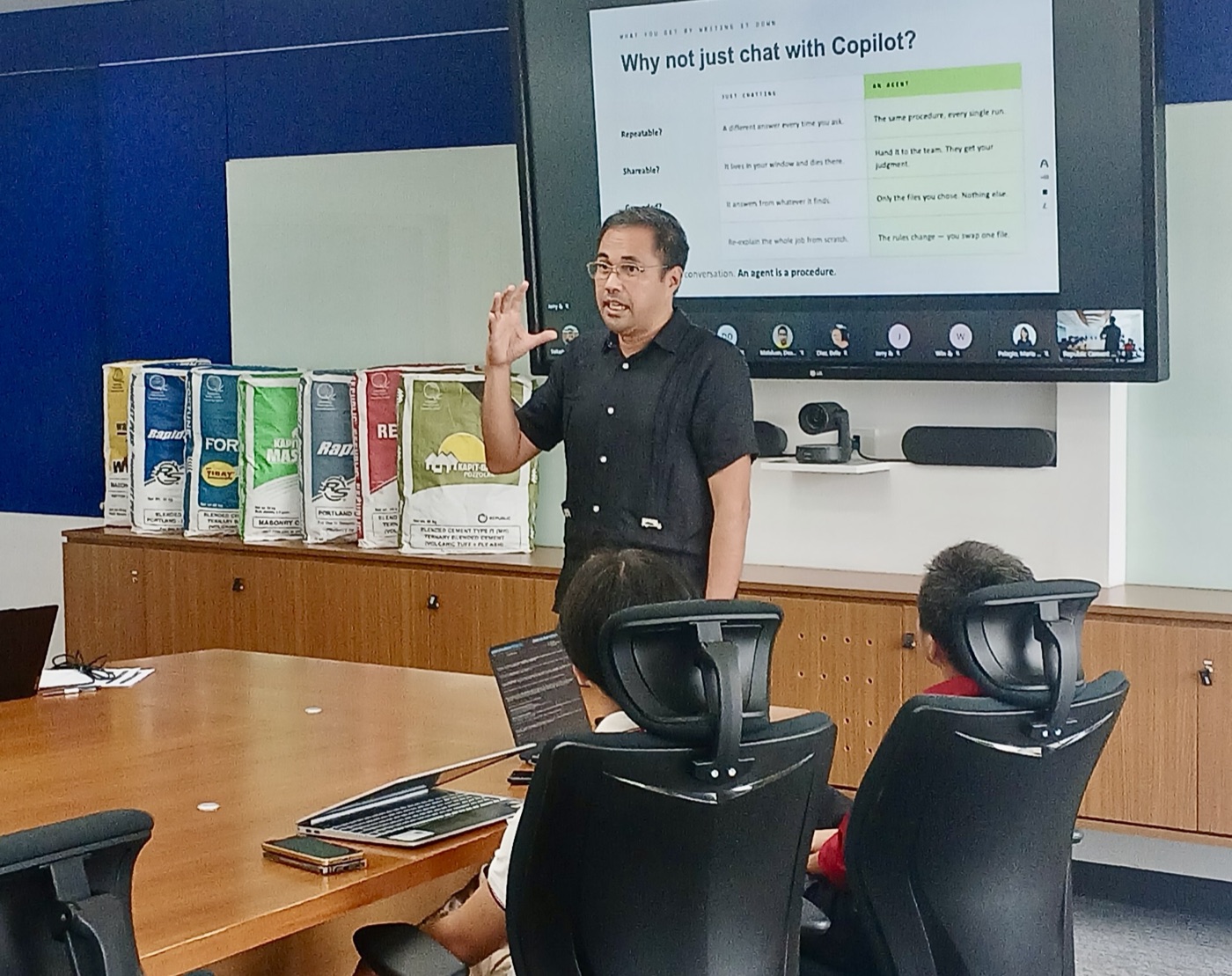 Jerry Ilao working with a leadership team in a boardroom session