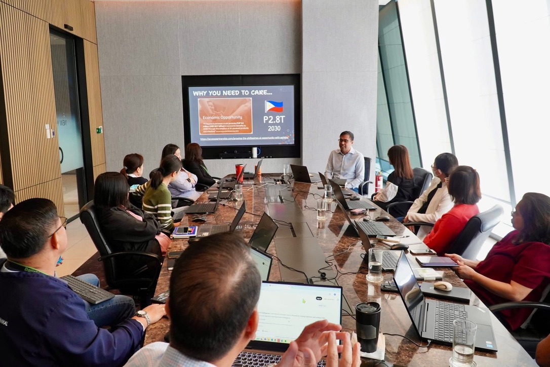 Executive AI workshop — leaders working through the roadmap at the boardroom table